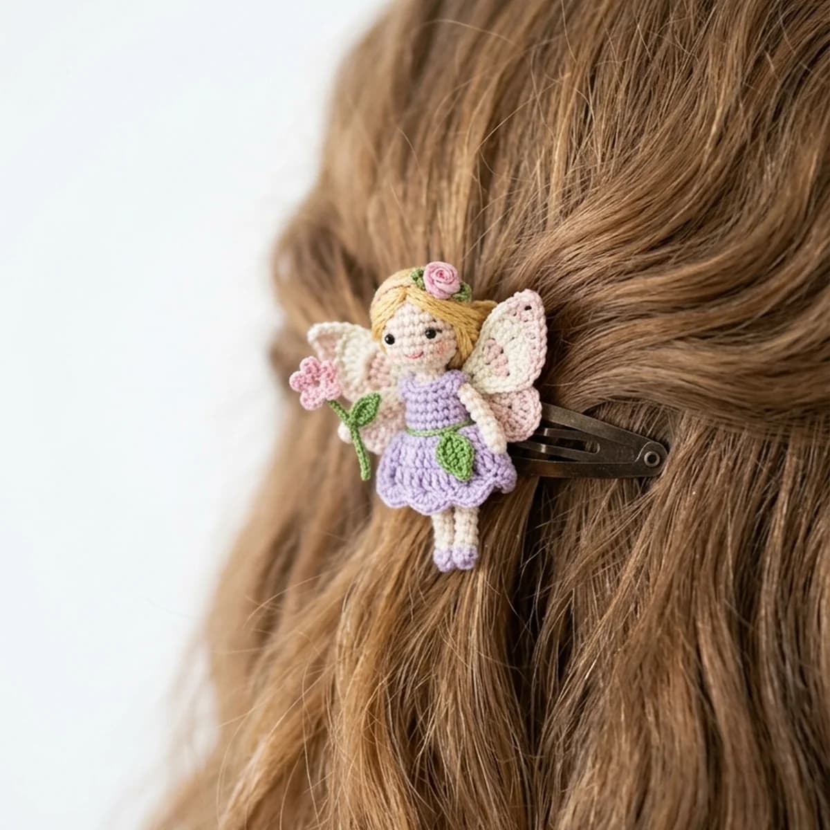 Magical flower fairy crochet hair clip in green and pink handmade with a small leaf