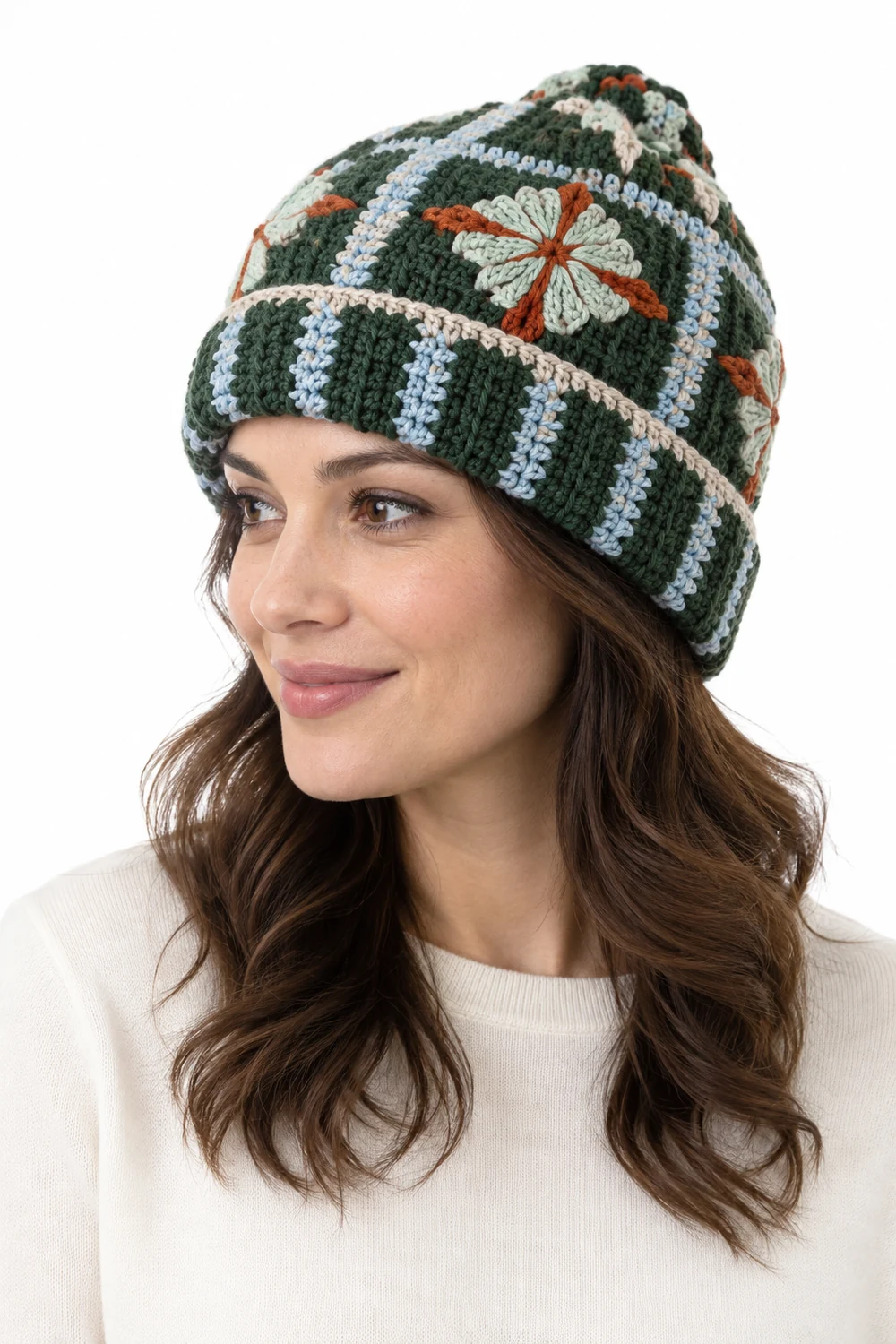 Forest green ribbed crochet beanie with compass petal geometry and folded cuff