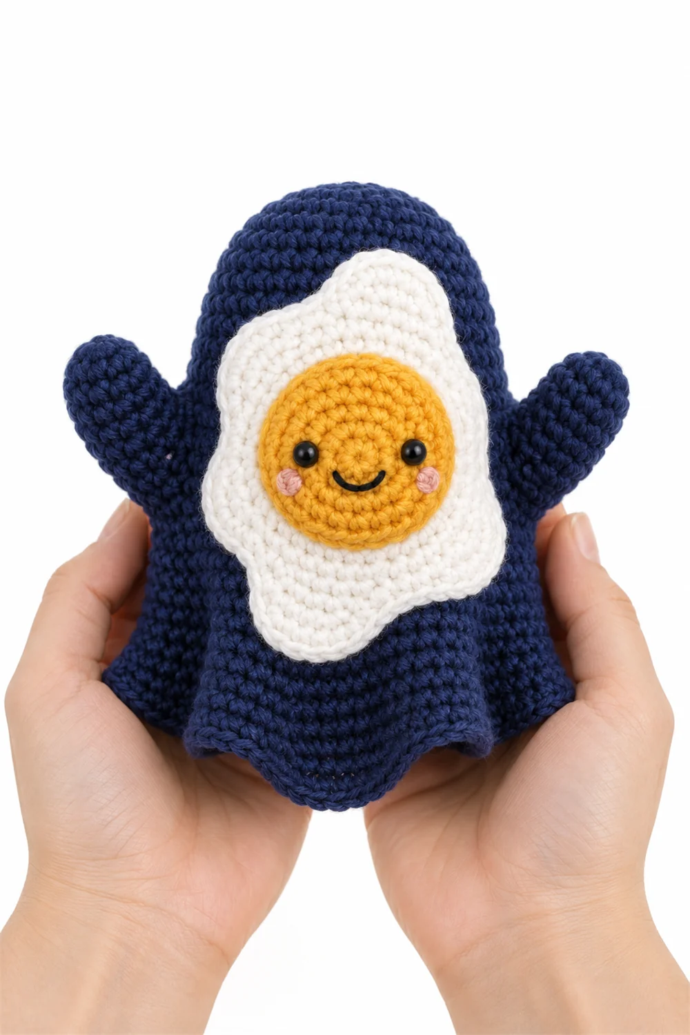 Navy blue crochet fried egg spirit with golden yolk face