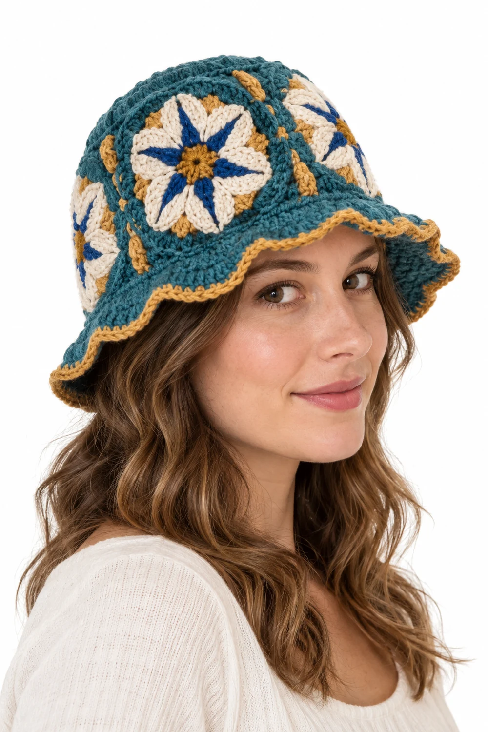 Petrol teal crochet bucket hat with compass petal geometry and scalloped brim